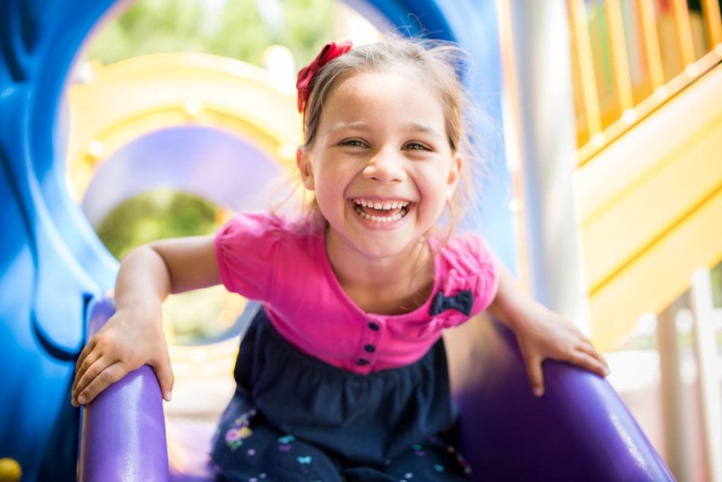 Young girl playing at a local park in Owensboro