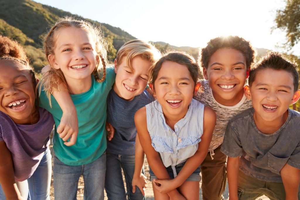 Group of smiling children in the Owensboro community